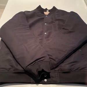 This is a men's large bomber jacket from Maison Kituńe.